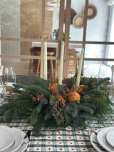 Centro navideño naranjas y canelas